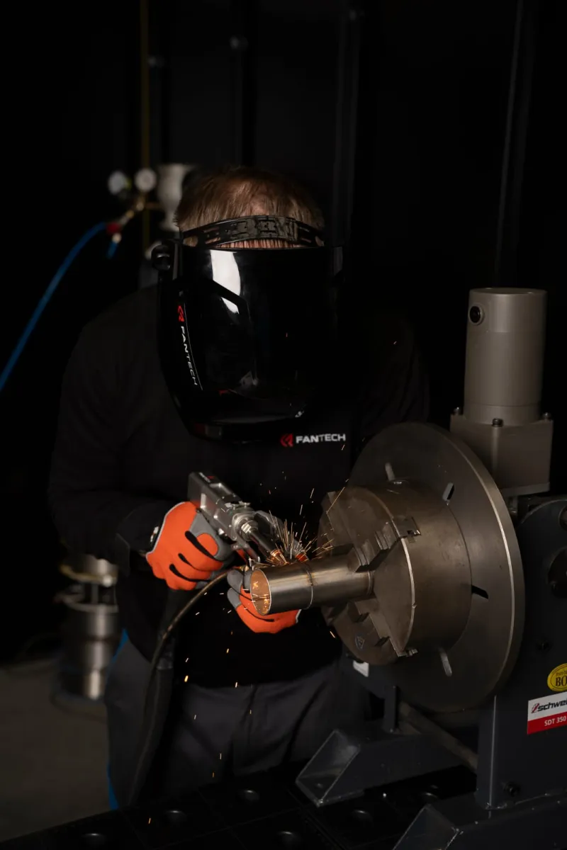 Laser welding in a rotary positioner